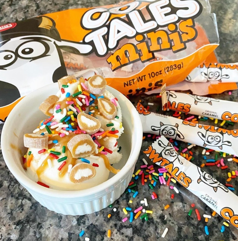 Cow Tales Minis on the table with a bowl of ice cream and sprinkles