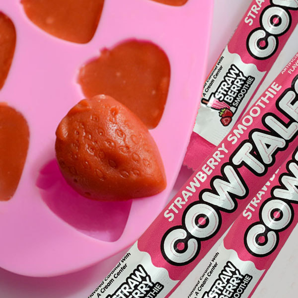 Strawberry Smoothie Cow Tale and a strawberry shaped gummy candy