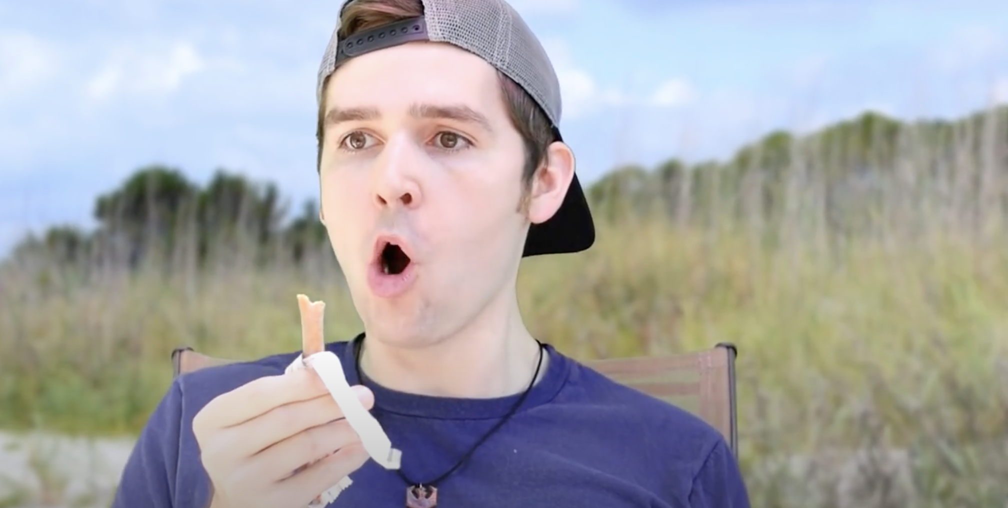man on a beach with a Cow Tale 