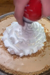 Caramel Creams® Pie filled with vanilla cream, topped with marshmallow fluff and whipped cream, created by recipe developer Bel's Pies.