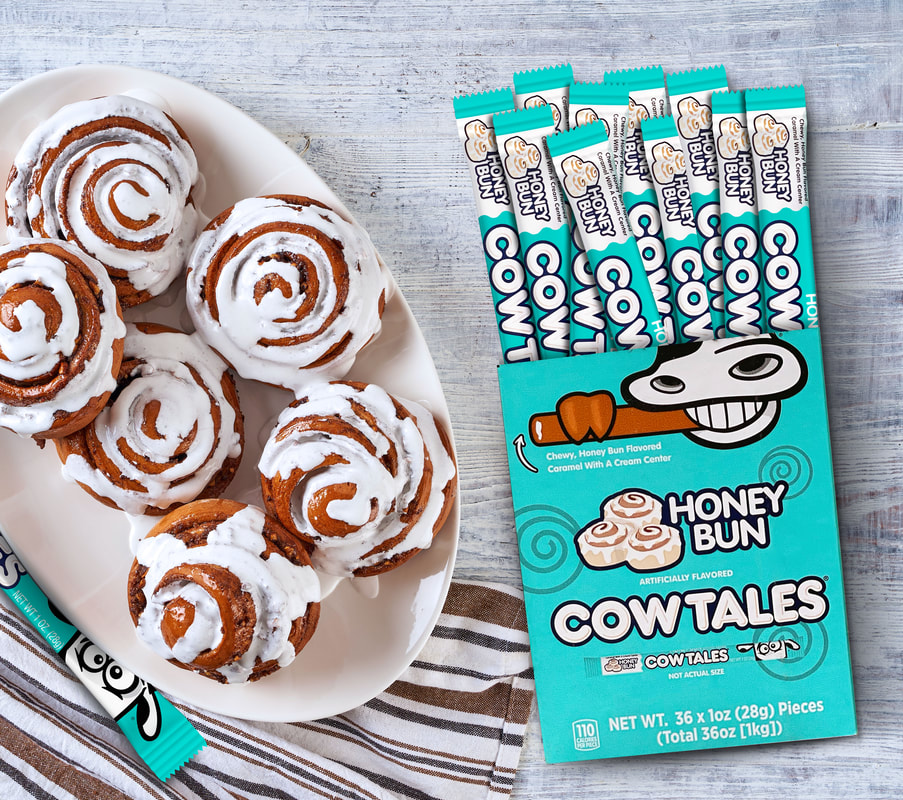 A plate of honey buns next to a pack of honey bun Cow Tales®